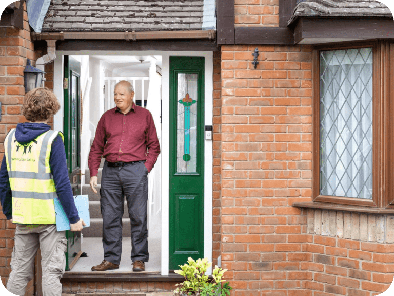 Vaughan at home greeting a Retrofit installer